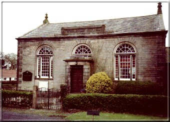 Wesleyan Chapel - the white tablet stone by the porch is dedicated to the memory of George Fishwick